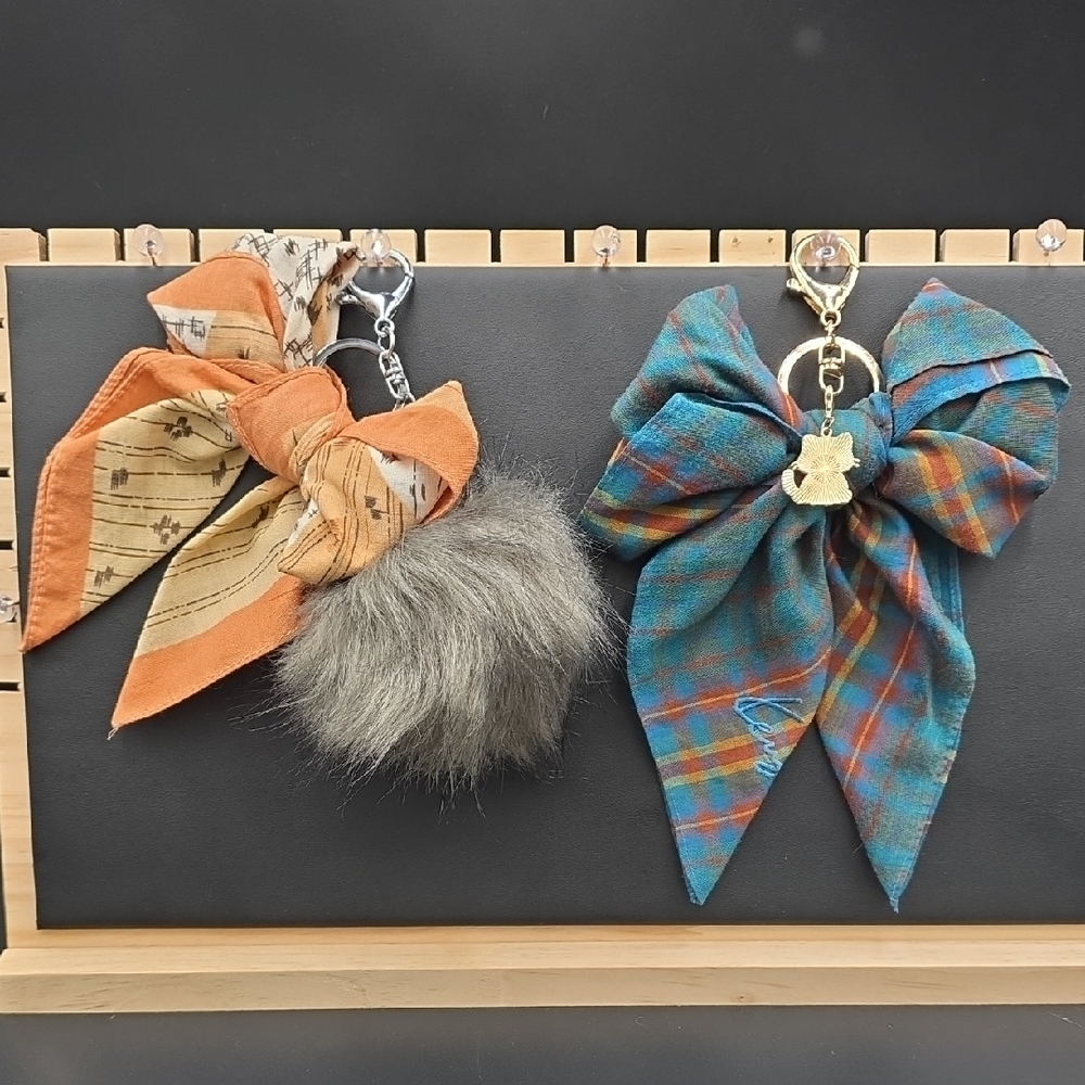 Orange and Blue Bow Keychains with Charms